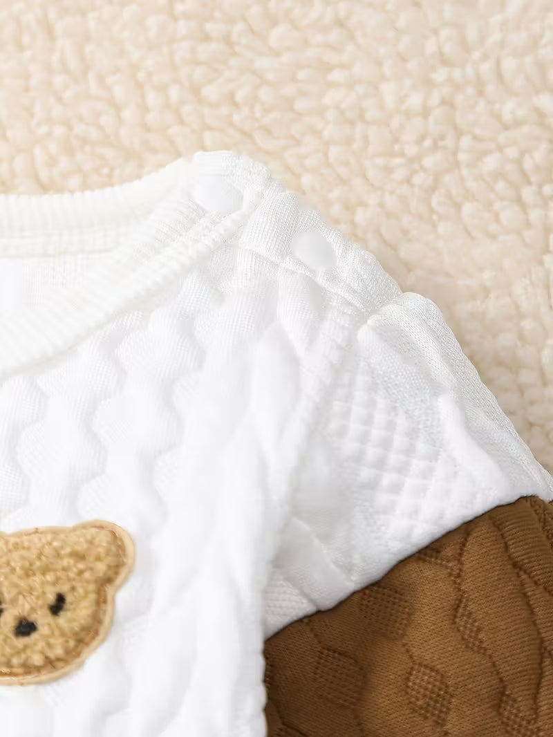 Baby boy embroidered romper close-up